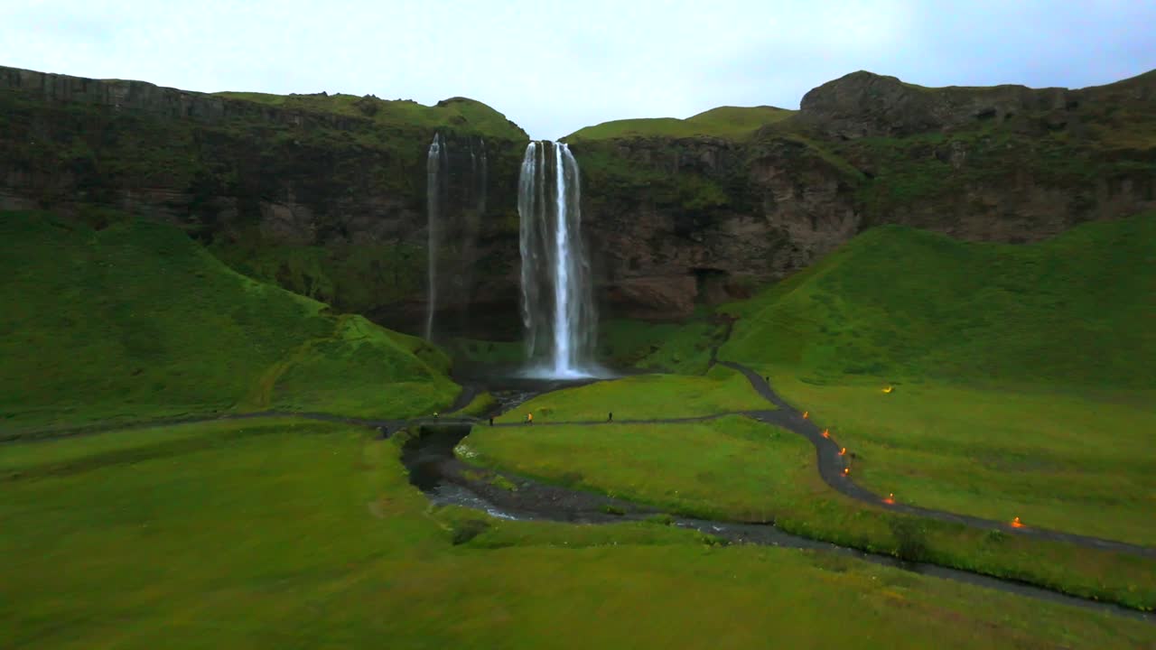 The aerial perspective of Seljalandsfoss highlights its grandeur, making this iconic Icelandic landmark even more breathtaking.