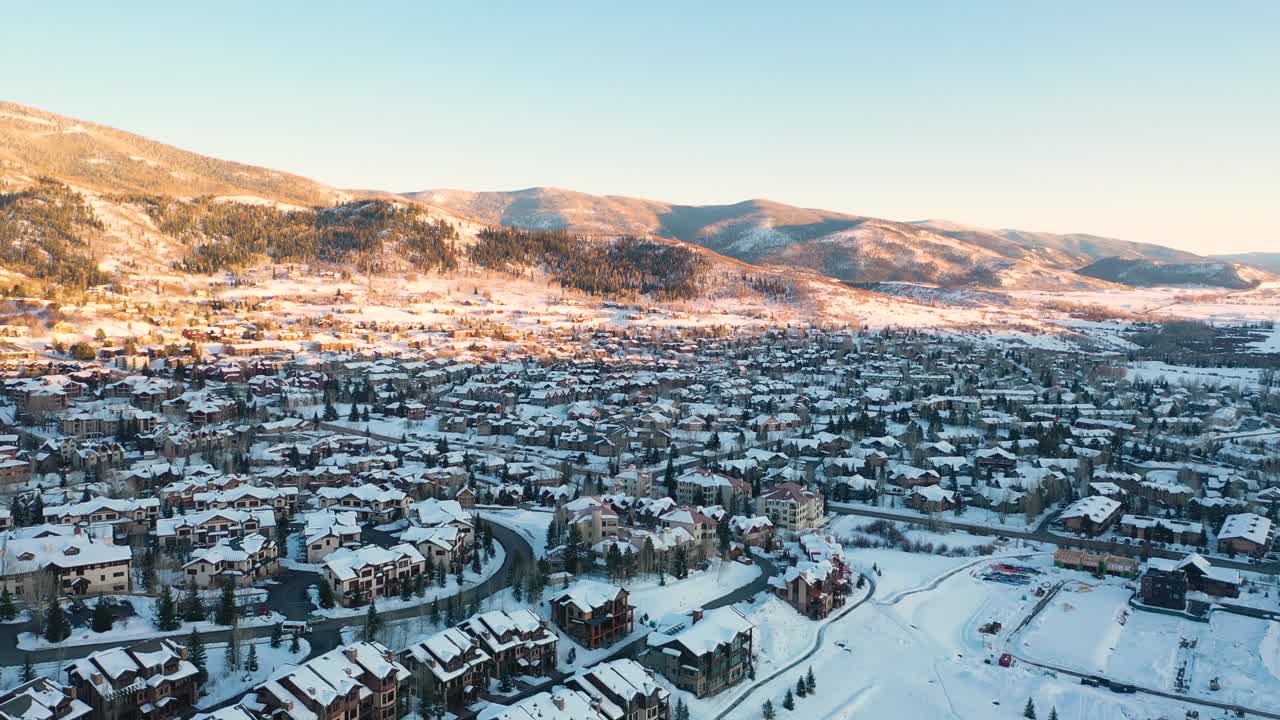 Beautiful quiet snow covered mountain town of Colorado in winter -Aerial drone