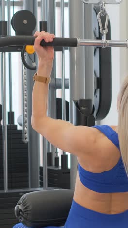 woman working out on a cable machine