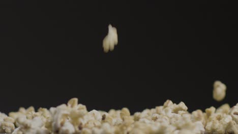 close up shot of popcorn falling down