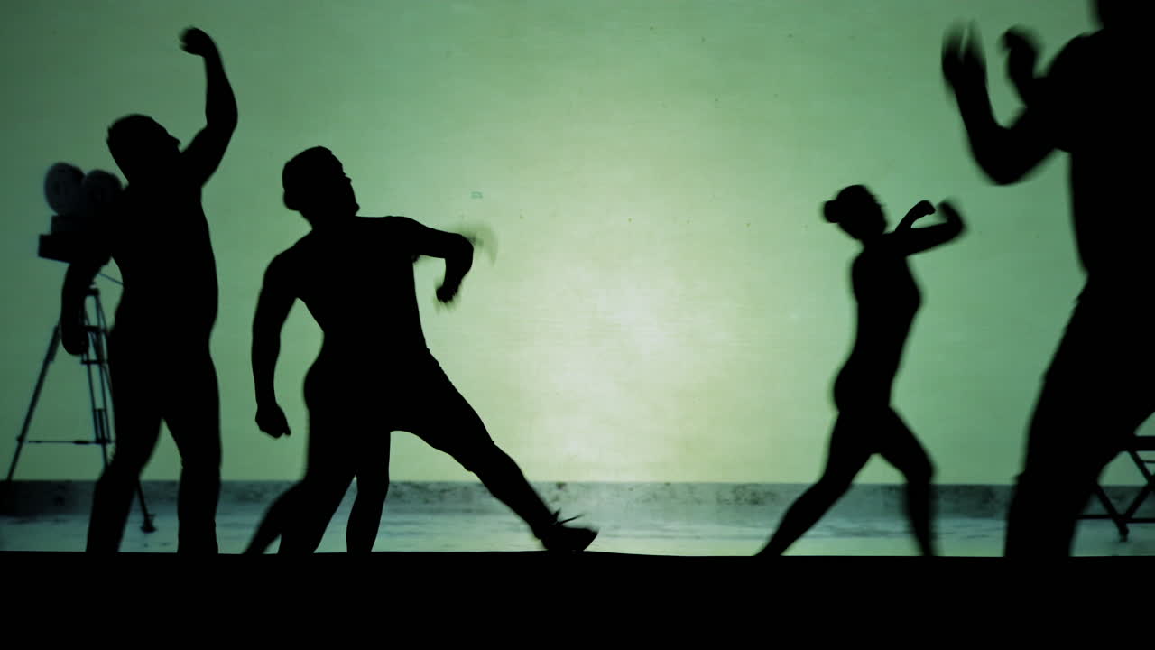 siluetas de personas bailando