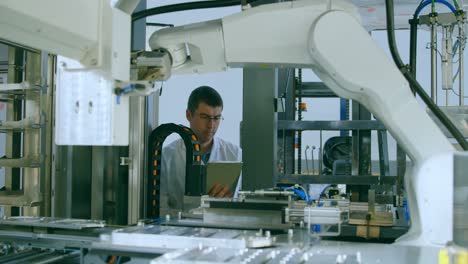 robotic engineer using digital tablet in warehouse 4k