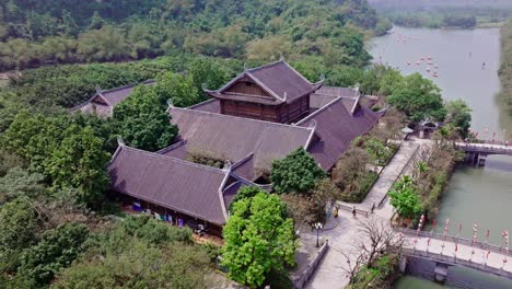 this drone footage captures the majestic architecture of ancient vietnamese buildings in tam coc, vietnam