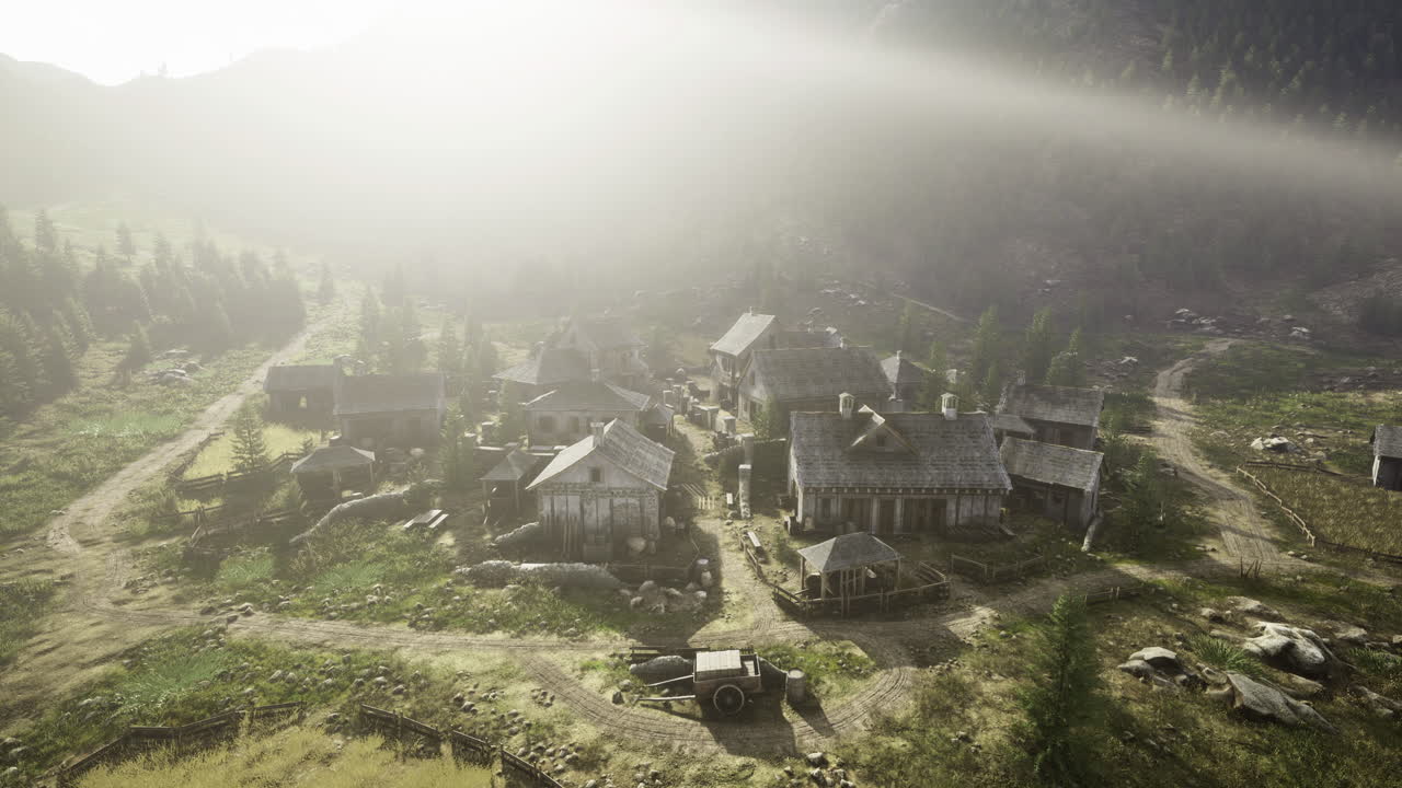 Rustic village nestled in the mountains during the early morning light