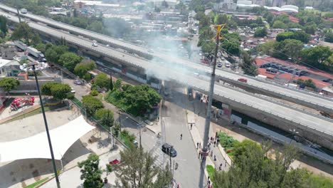 aerial clip flying fire under bridge