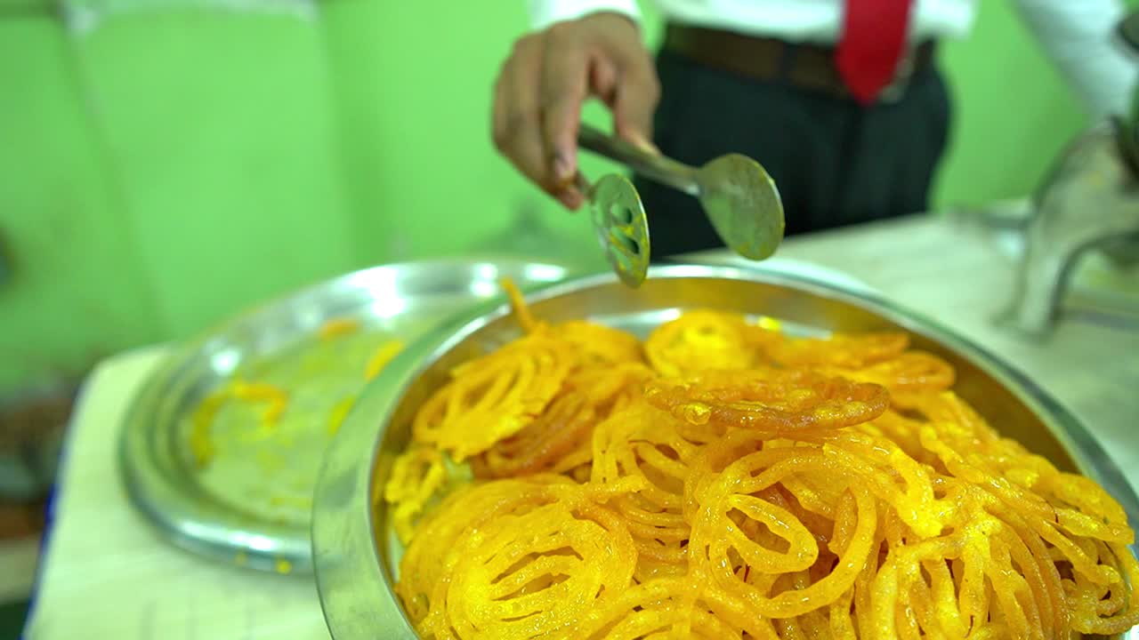 Slow motion cinematic shot of jalebi