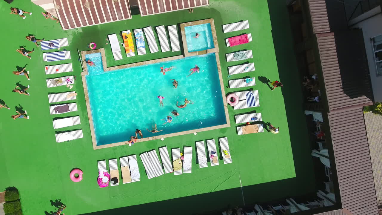 Aerial View of Rooftop Swimming Pool with People