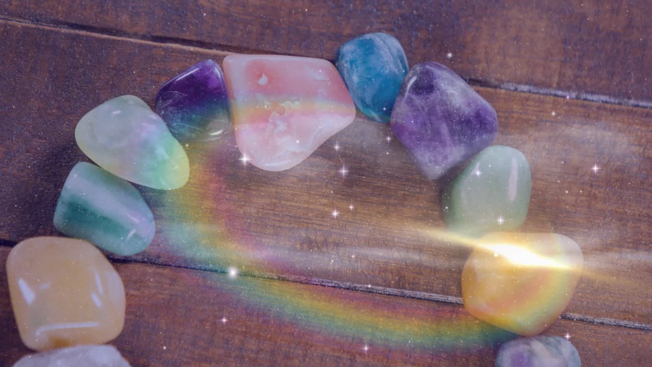 animação de estrelas e galáxias movendo-se sobre pedras em superfície de madeira