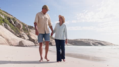 Walking,-beach-and-senior-couple-holding-hands