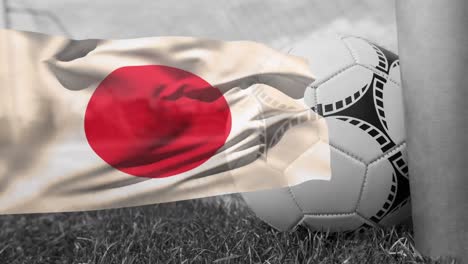 animation of flag of japan and football over stadium