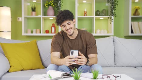 Handsome-young-man-texting-with-his-girlfriend.