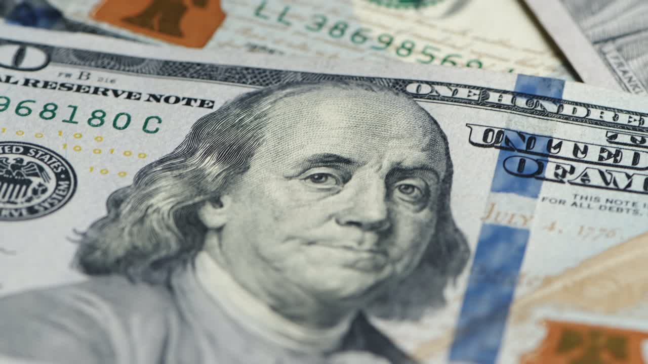 cierre de la moneda billetes de dólar de estados unidos. ingresos y concepto de negocio.