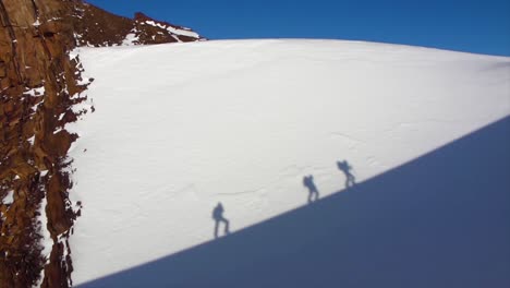 hikers on a snowy mountain