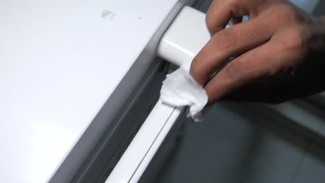 cleaning a refrigerator handle