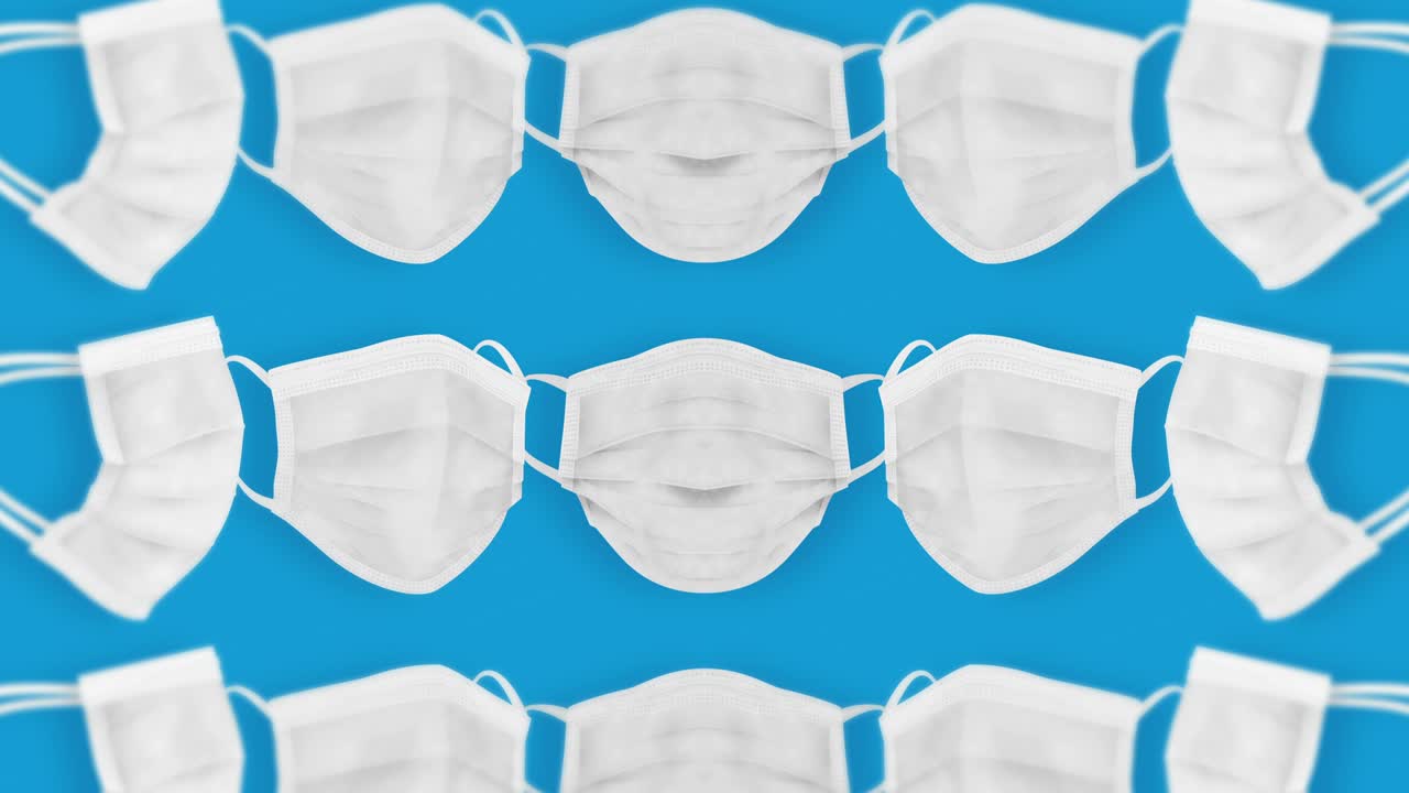 바이러스로부터 보호하기 위해 입과 코를 는 많은 의료 마스크. 건강 관리 개념. 3d 현실적인 의료 마스크, 루프 애니메이션.