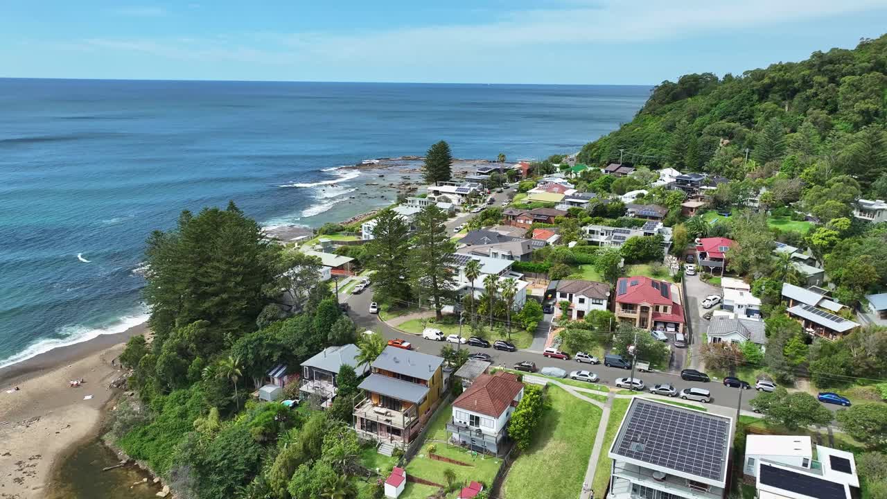 Aerial view of Coalcliff town and coastline near Sea Cliff Bridge on the Pacific Ocean