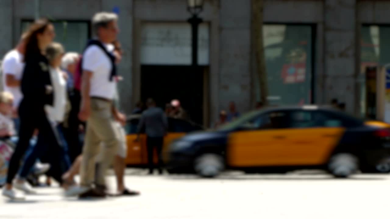 Side view blurry pedestrians walking.Time Lapse.