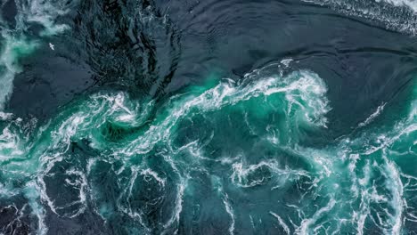 waves of water of the river and the sea meet each other during high tide and low tide.