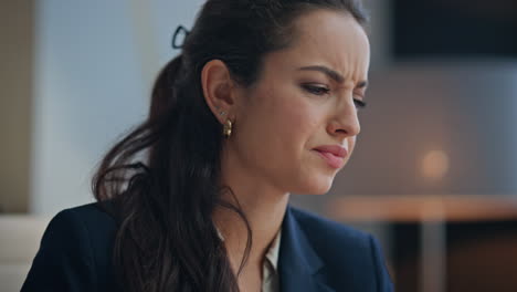 closeup nervous loser reacting fail holding documents at buro. disappointed boss