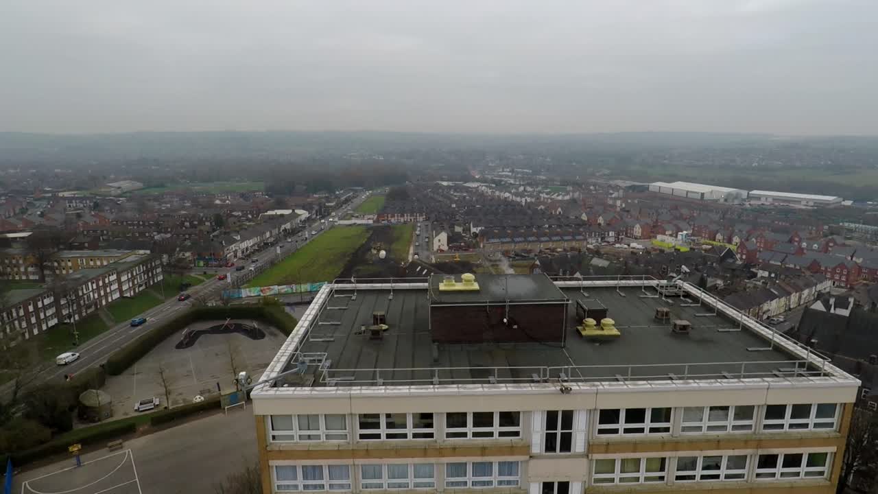 Aerial footage view of high rise tower blocks, flats built in the city of Stoke on Trent to accommodate the increasing population, council housing crisis