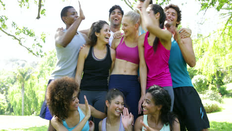 fit group of friends posing for the camera