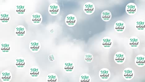 Animation-of-stay-natural-text-over-clouds-and-plants