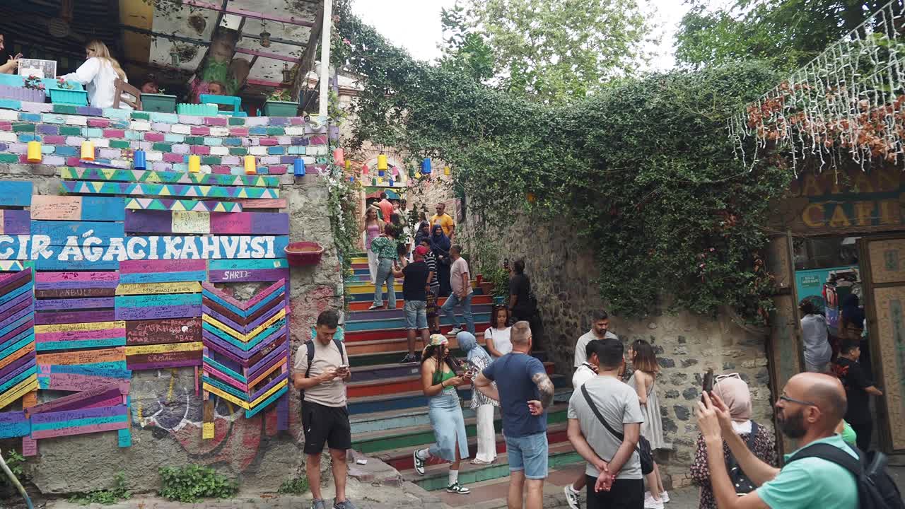 Colorful Cafe with People on Steps