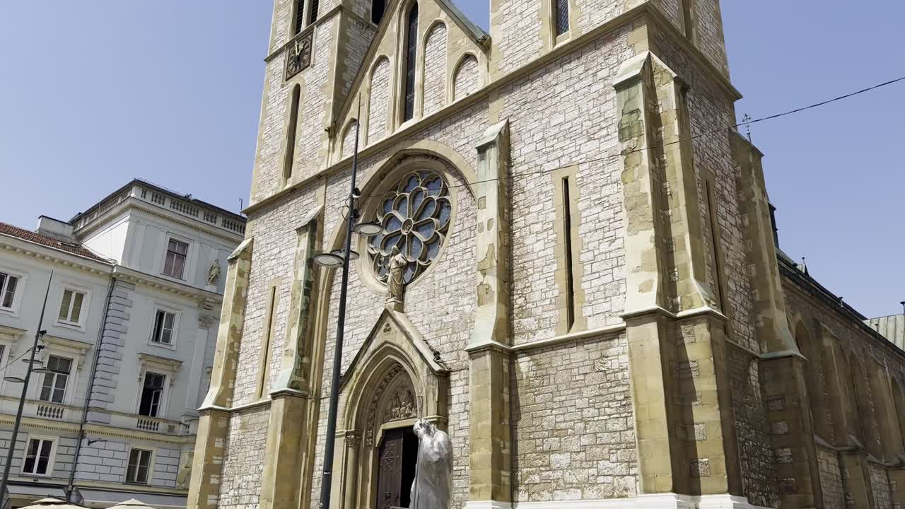 Front facade of Sacred Heart Cathedral in Sarajevo Old Town - Gothic Rose window, Bosnia and Herzegovina