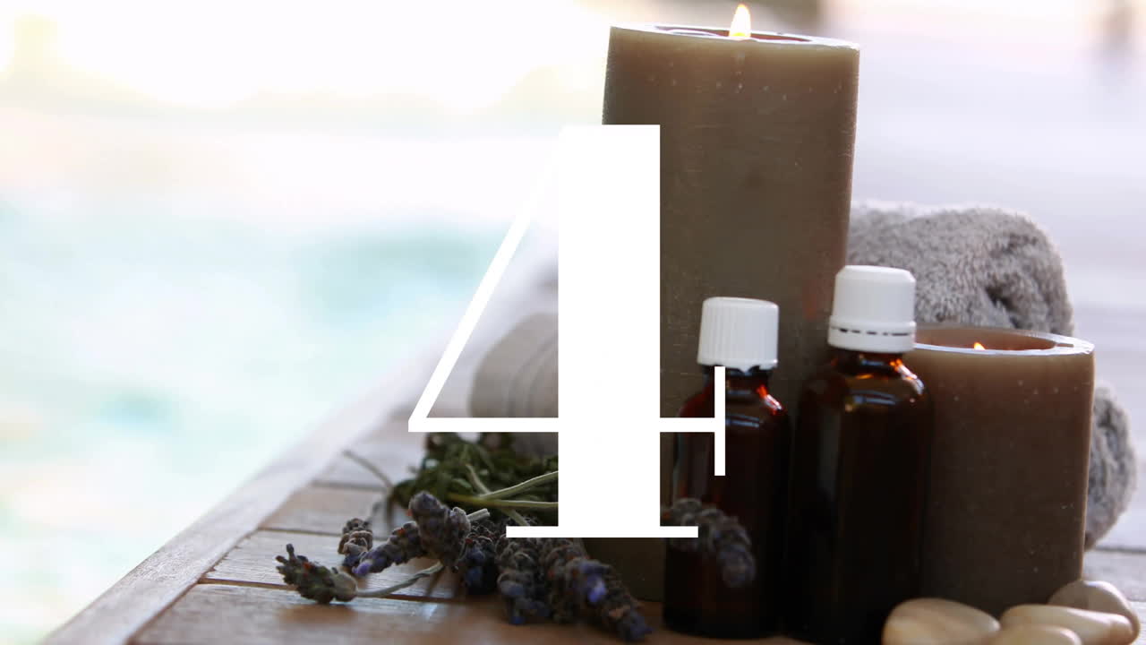 나무 표면에 스파 불, 에센셜 오일 및 라벤더에 대한 5 번의 애니메이션