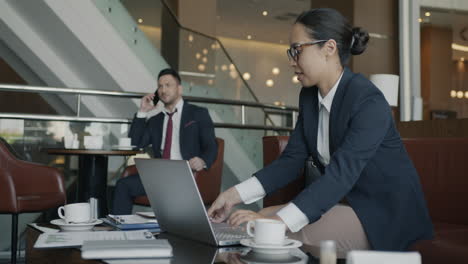business people working in a coffee shop