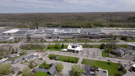 amway north american headquarters building in ada, michigan with drone video moving left to right.