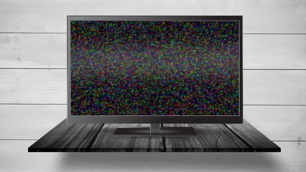 Flat screen TV with a blank screen and pixel noise