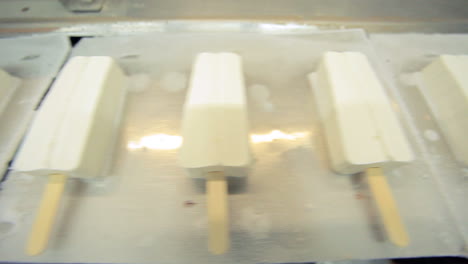 Ice-cream-manufacturing-line.-Ice-cream-product-on-conveyor-line.-Food-industry