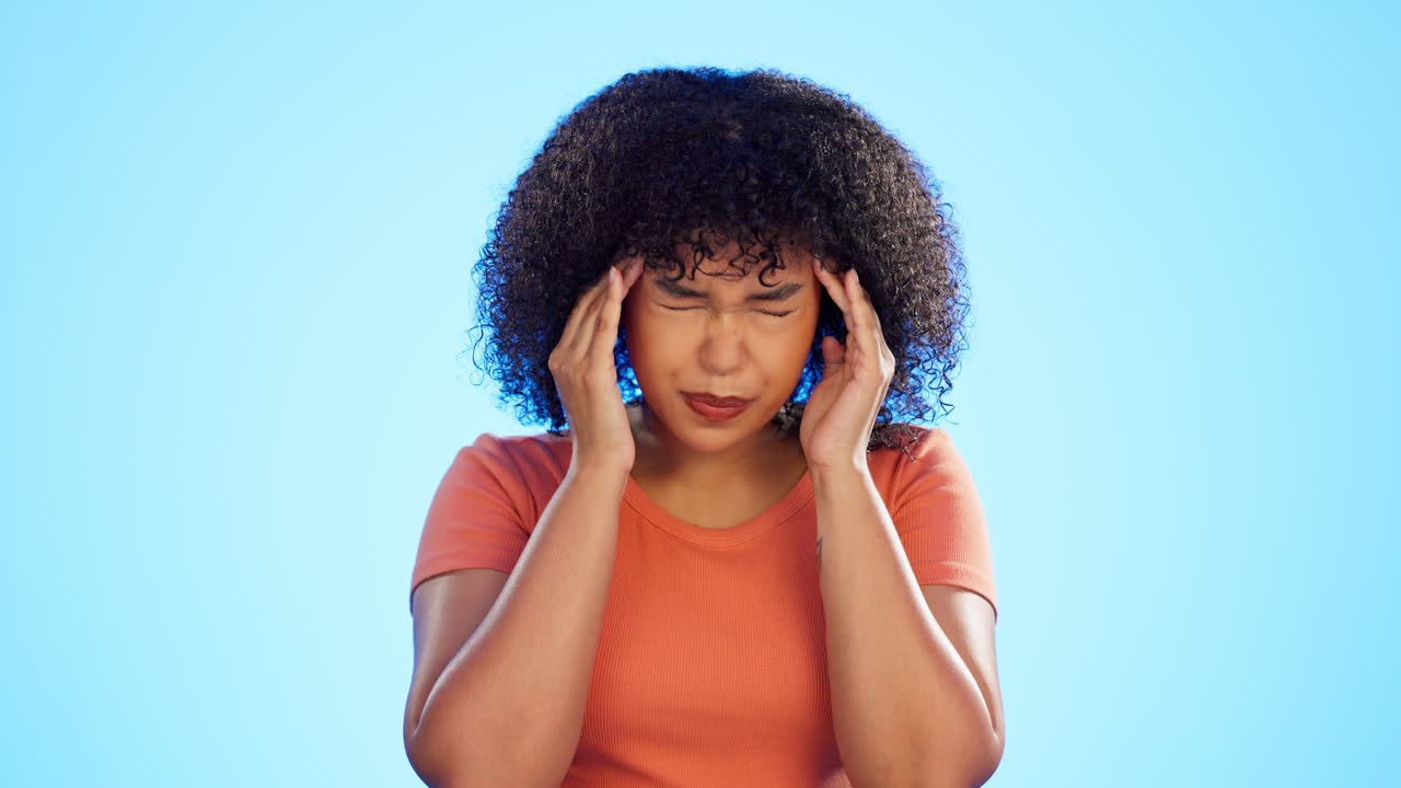 Headache, pain and face of woman on blue