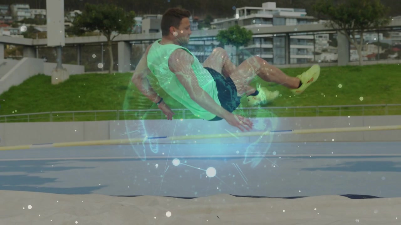 Atleta masculino corriendo hacia el foso de arena, impulsándose, superando la barra y aterrizando mientras una esfera cian se desvanece.