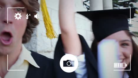 tomar fotos de los estudiantes que se gradúan con una cámara digital