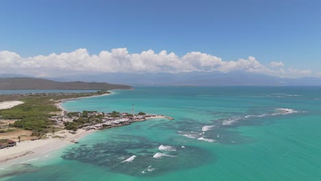 aerial drone footage showcasing the vibrant coastline of hellshire beach in jamaica. this video captures the scenic beauty of turquoise waters