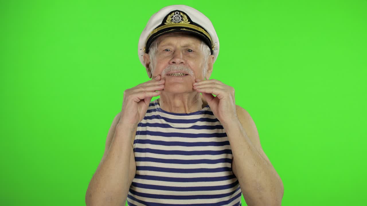 Elderly sailor man with mustache. Old sailorman on chroma key background