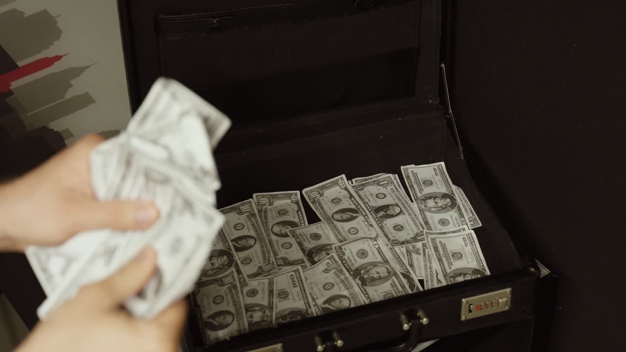 Close-up of hands counting banknotes in front of an open briefcase filled with cash. Concept of wealth, financial transactions, business deals, corruption, and large amounts of money
