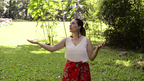 beautiful girl meditates in forest