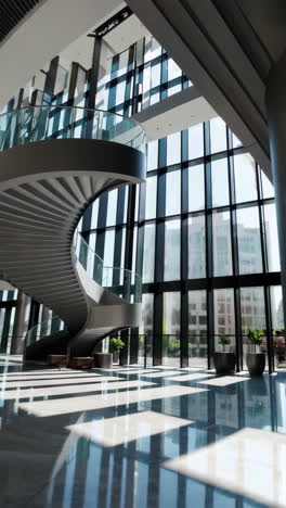 modern architectural lobby with spiral staircase