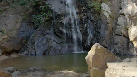 natural pool below the yelapa waterfall at summer in yelapa, jalisco, mexico