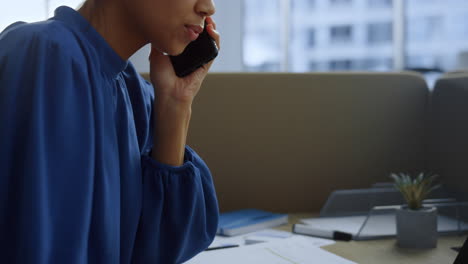 Businesswoman-typing-message-on-cellphone.-Executive-talking-on-mobile-phone