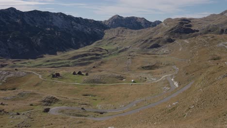 panorama view mountain pass road, durmitor in montenegro, countryside landscape with motorcycle