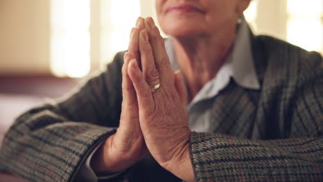 Prayer-hands,-church-and-senior-woman-worship