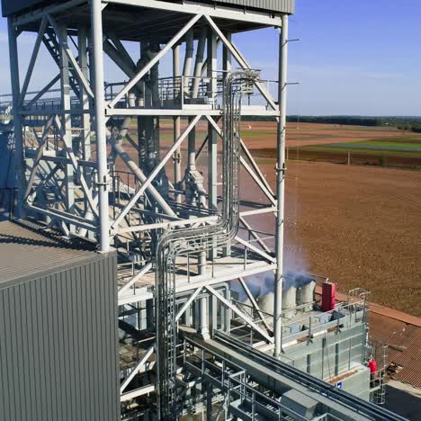 grain elevator. metal grain elevator in agricultural zone. aerial view