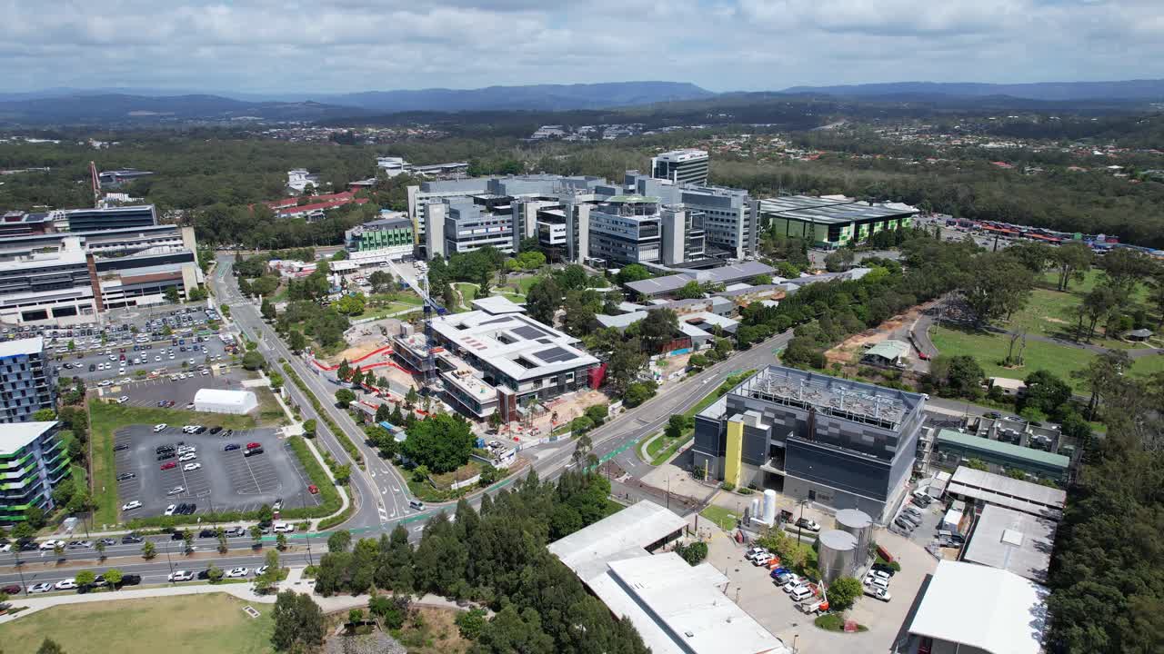 Aerial View of a Modern City Campus with Hospital and Construction