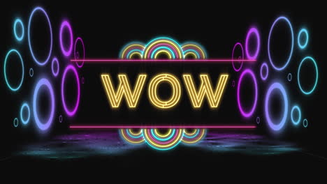 Animation-Von-Wow-Text-In-Gelbem-Neon-Und-Bunten-Neonringen-Auf-Schwarzem-Hintergrund