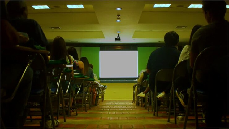 A conference room full of people.