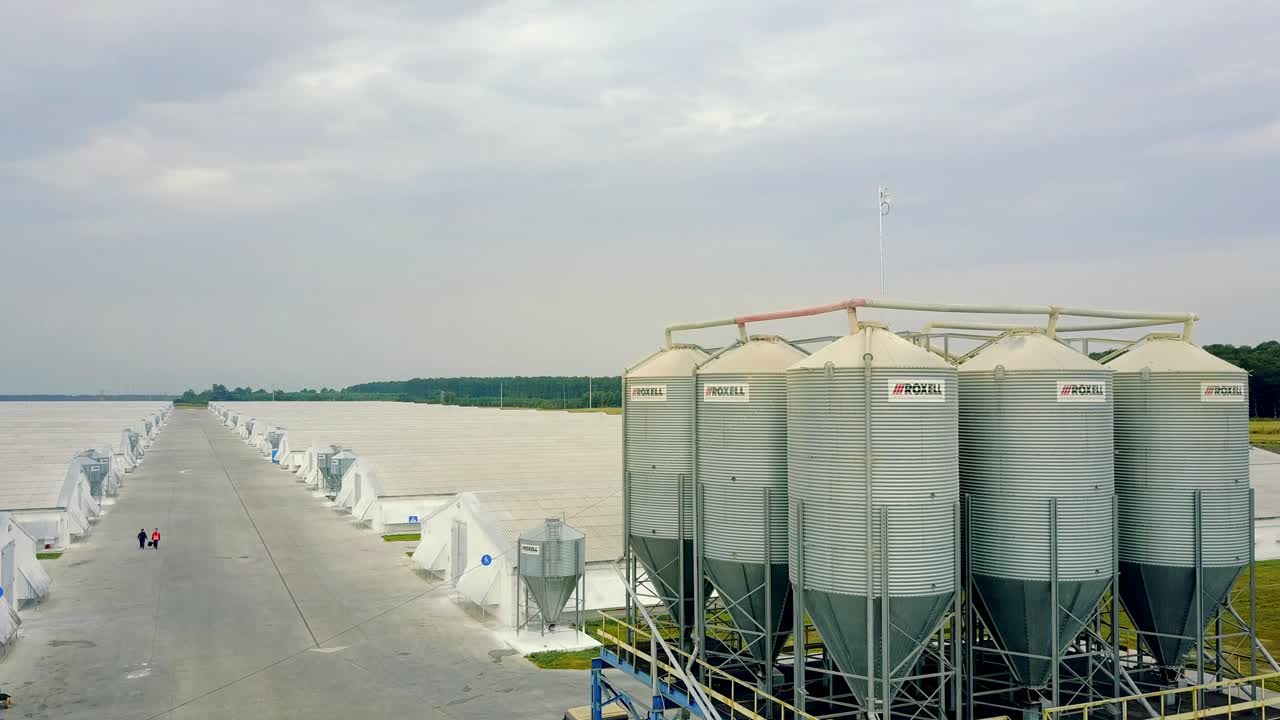 Aerial view over big poultry agricultural farm